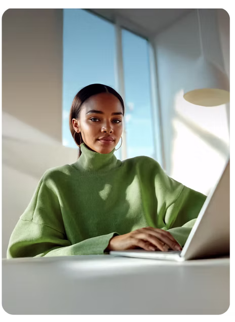 An embedded AI specialist working in a clean, modern office.